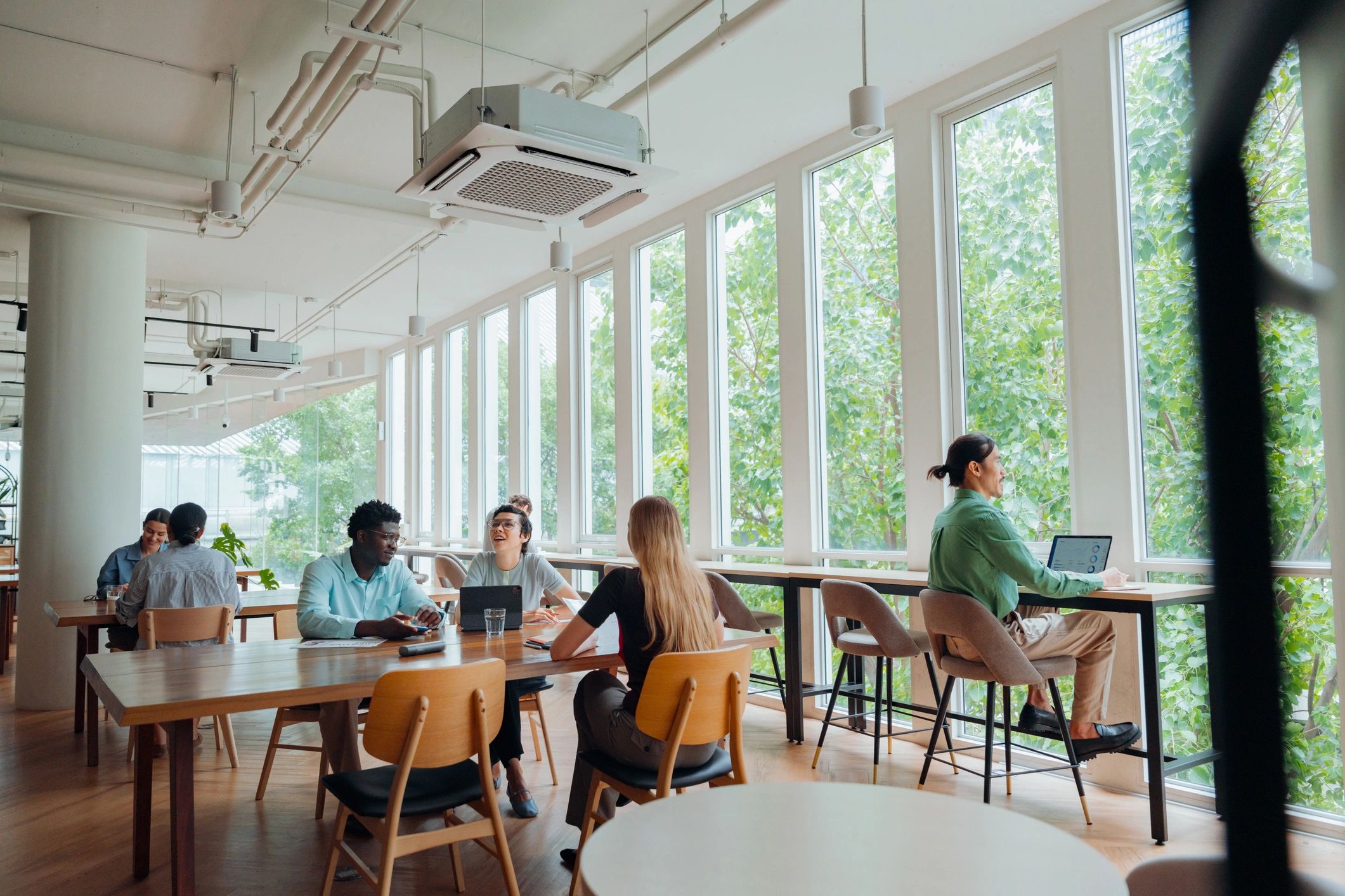 Professionals working together in a modern coworking space